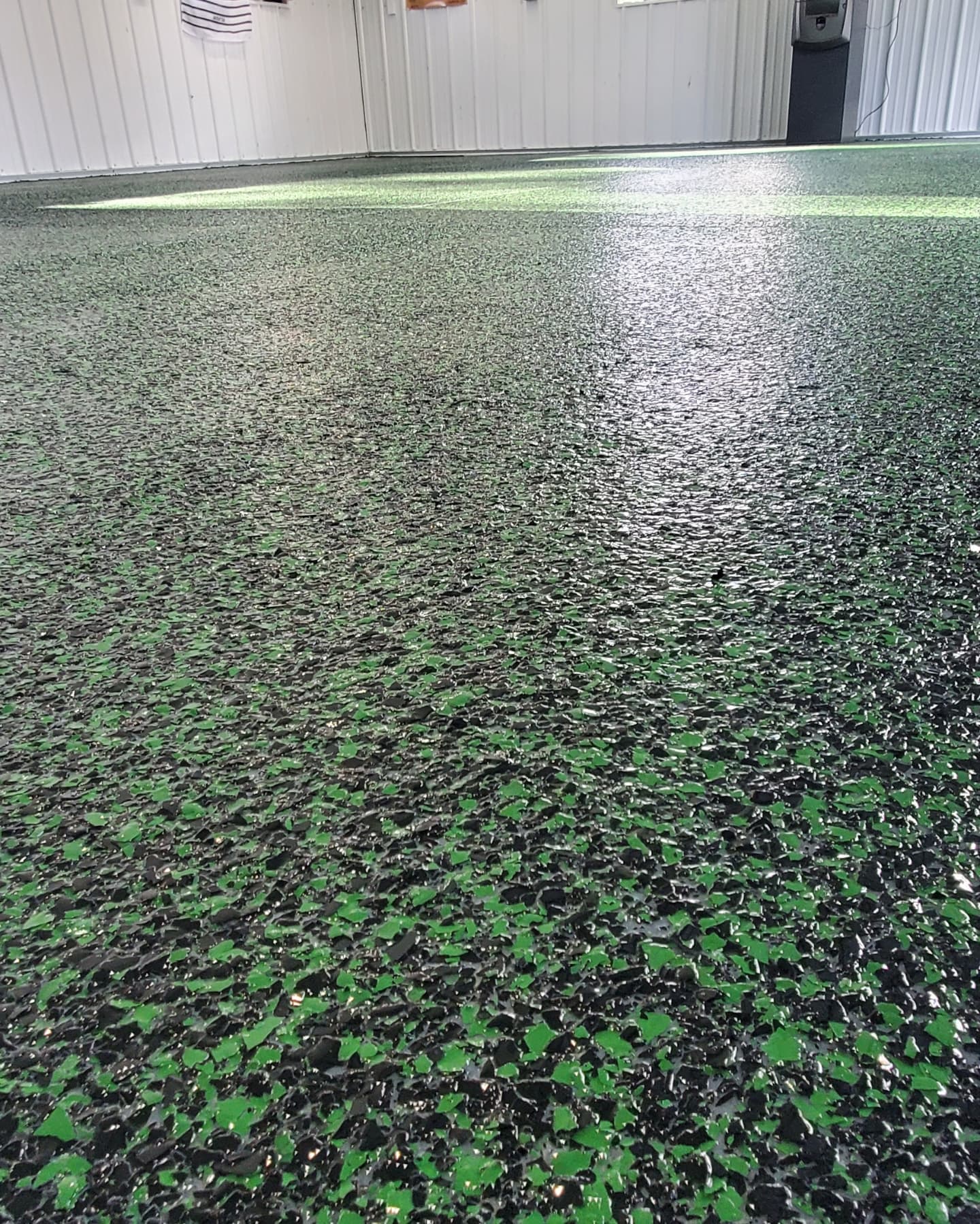 J&K Precision crew installing a resinous epoxy floor